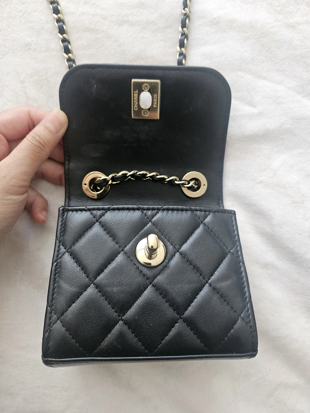 CHANEL Black Quilted Leather Mini Chain Wallet with Gold Hardware